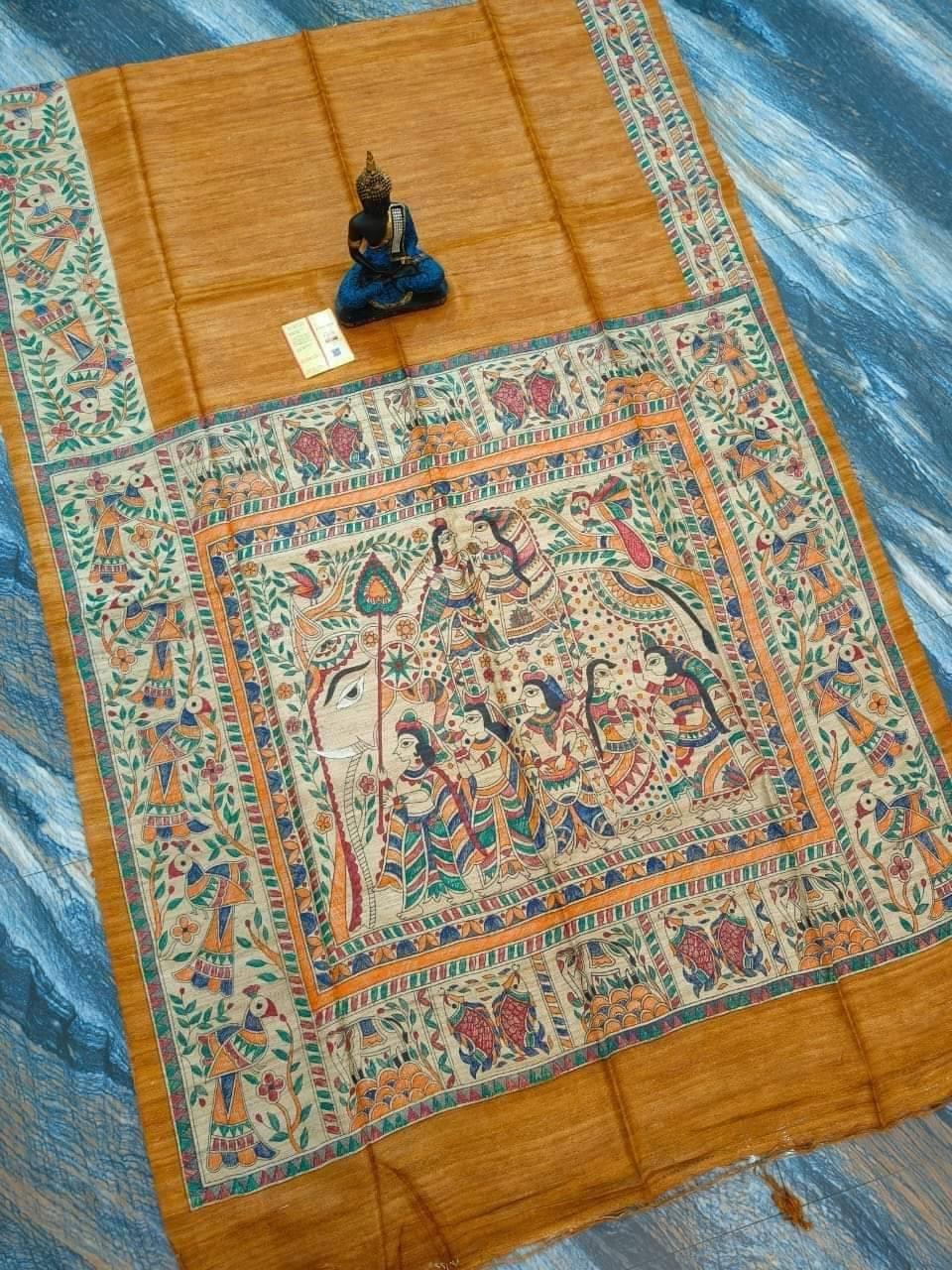 Handloom Pure Tussar Ghicha Silk Saree featuring handpainted Madhubani art on the anchal and border