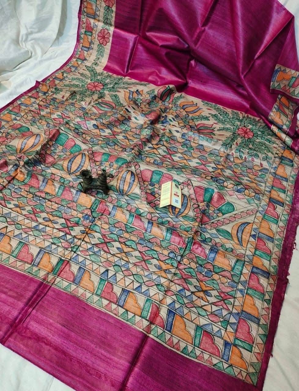Handloom Pure Tussar Ghicha Silk Saree featuring handpainted Madhubani art on the anchal and border