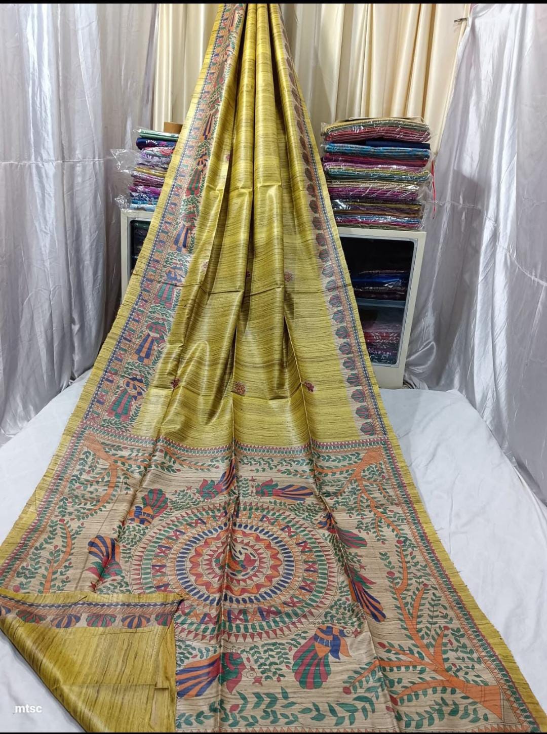 Handloom Pure Tussar Ghicha Silk Saree featuring handpainted Madhubani art on the anchal and border