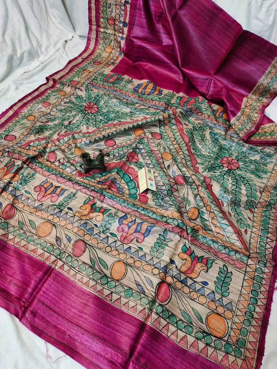 Handloom Pure Tussar Ghicha Silk Saree featuring handpainted Madhubani art on the anchal and border