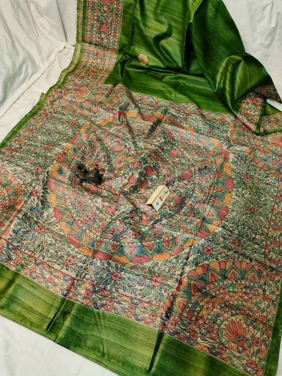 Handloom Pure Tussar Ghicha Silk Saree featuring handpainted Madhubani art on the anchal and border