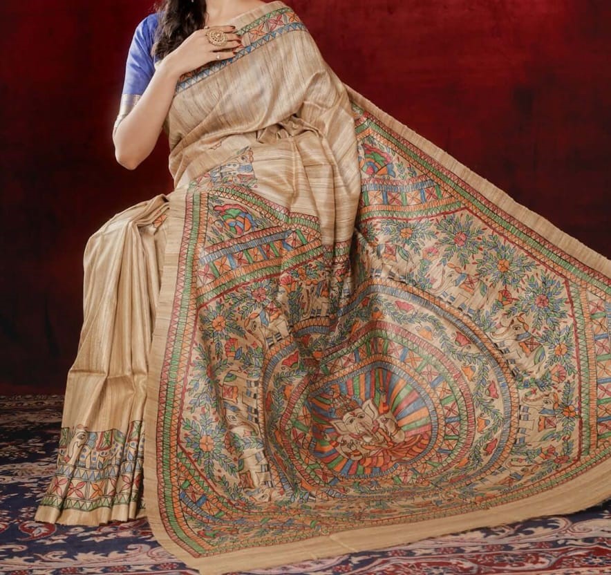 Handloom Pure Tussar Ghicha Silk Saree featuring handpainted Madhubani art on the anchal and border