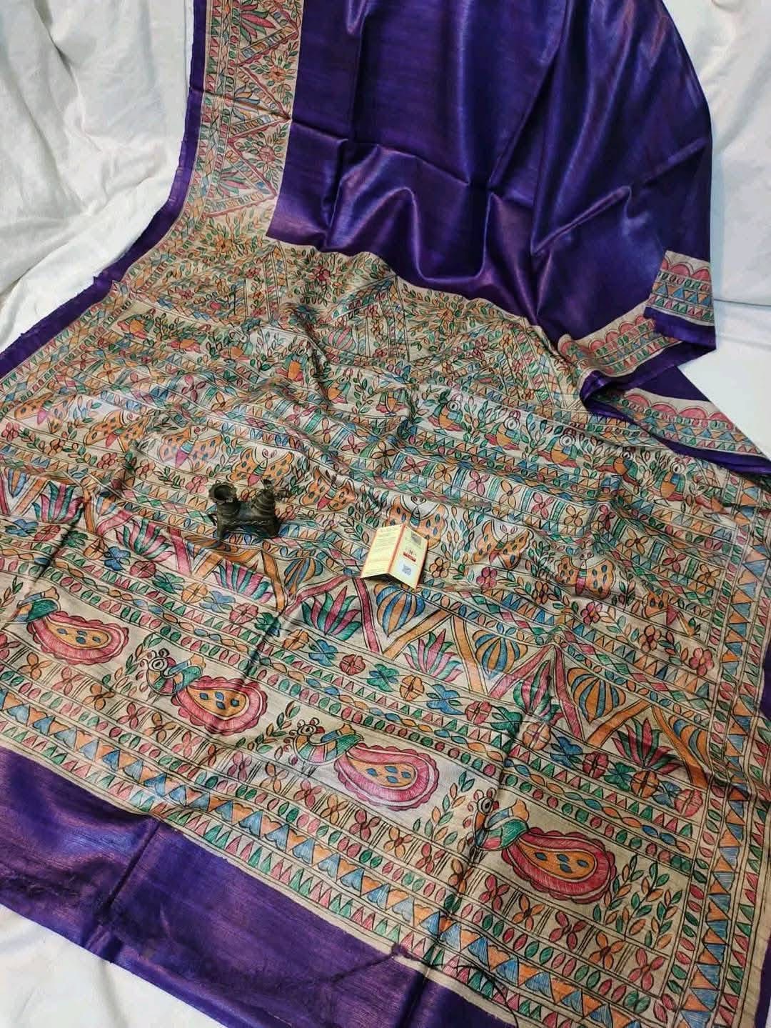 Handloom Pure Tussar Ghicha Silk Saree featuring handpainted Madhubani art on the anchal and border