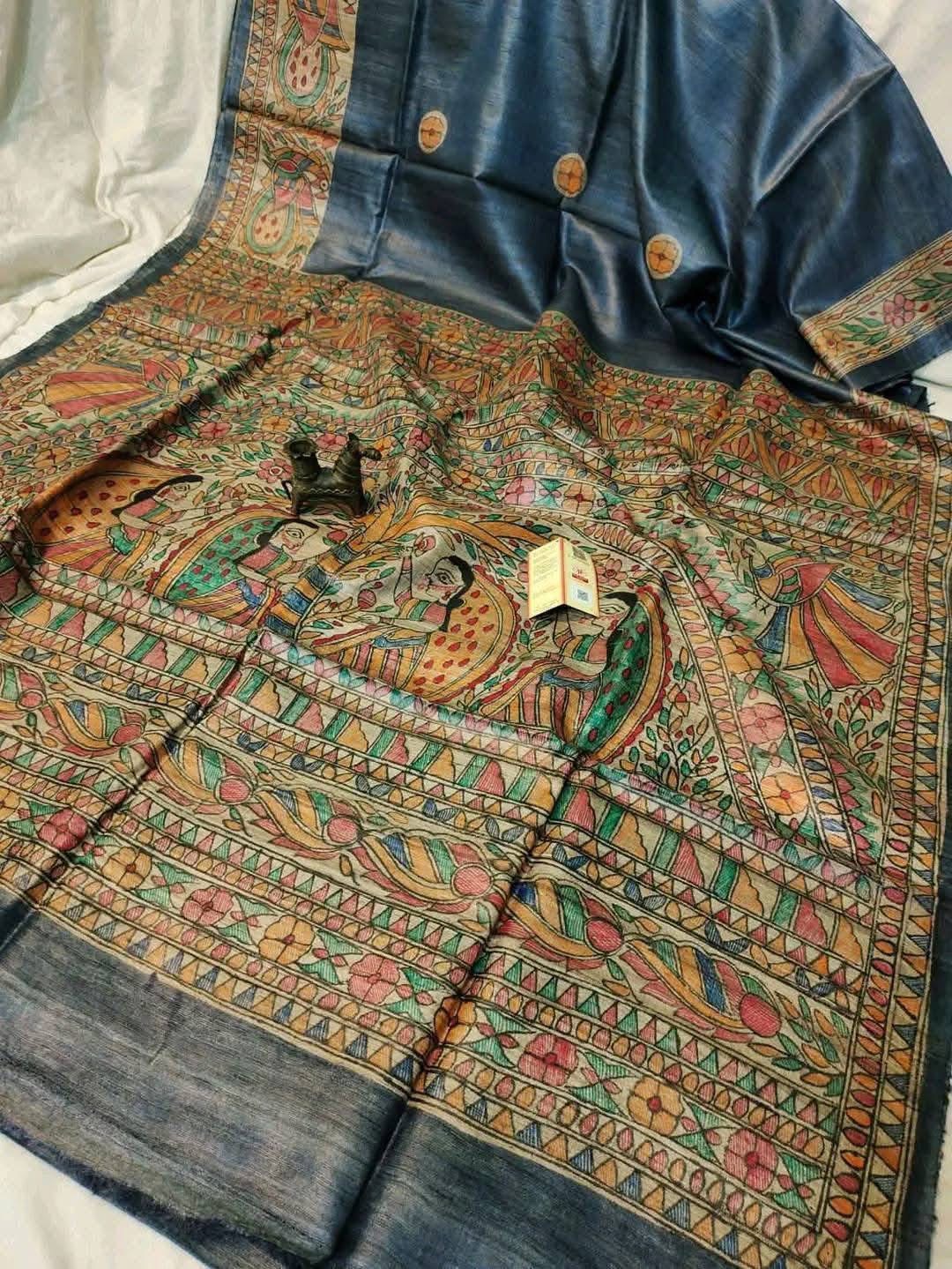 Handloom Pure Tussar Ghicha Silk Saree featuring handpainted Madhubani art on the anchal and border