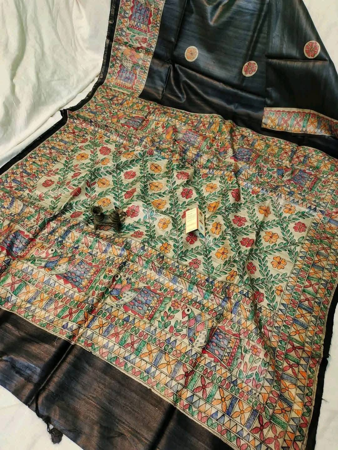 Handloom Pure Tussar Ghicha Silk Saree featuring handpainted Madhubani art on the anchal and border