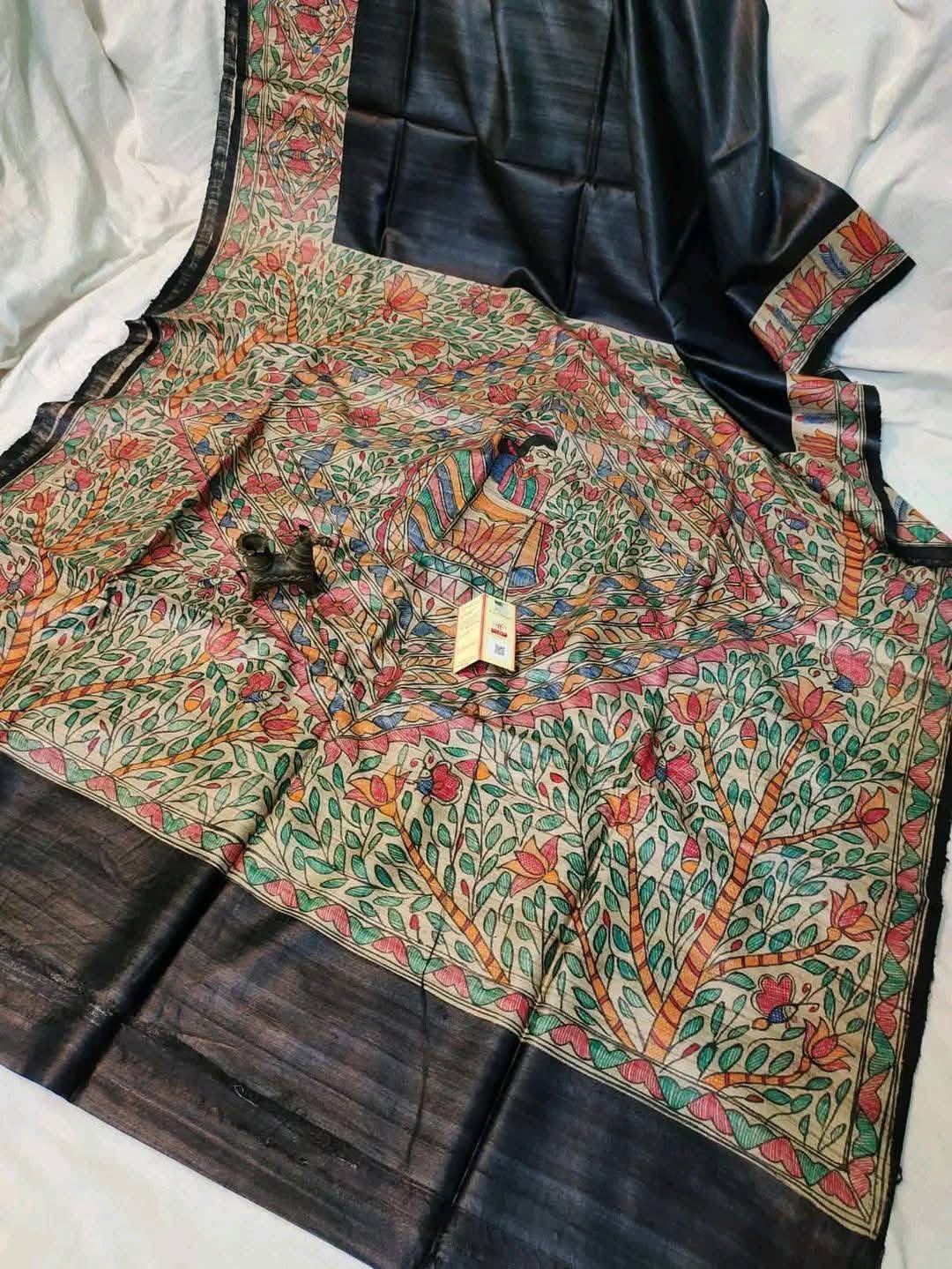 Handloom Pure Tussar Ghicha Silk Saree featuring handpainted Madhubani art on the anchal and border