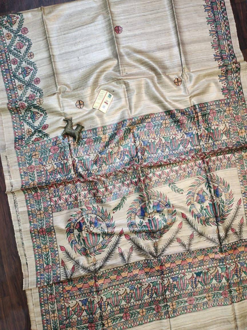 Handloom Pure Tussar Ghicha Silk Saree featuring handpainted Madhubani art on the anchal and border