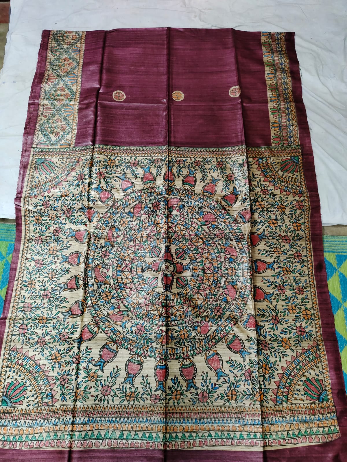 Handloom Pure Tussar Ghicha Silk Saree featuring handpainted Madhubani art on the anchal and border