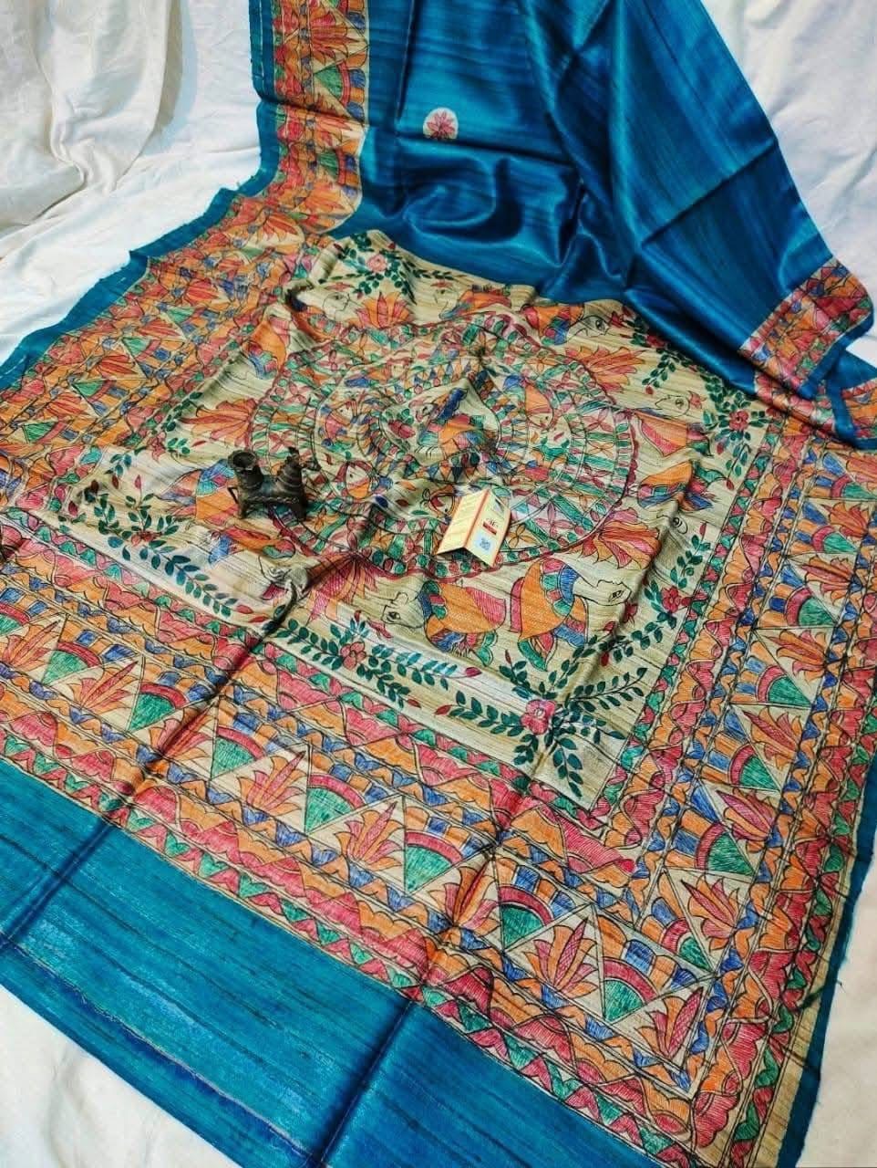 Handloom Pure Tussar Ghicha Silk Saree featuring handpainted Madhubani art on the anchal and border