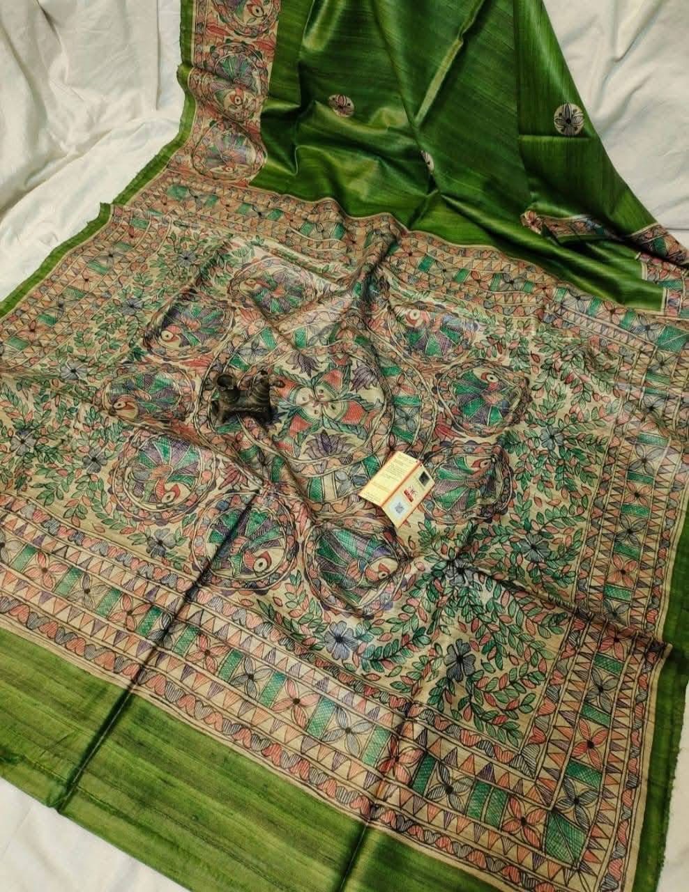 Handloom Pure Tussar Ghicha Silk Saree featuring handpainted Madhubani art on the anchal and border