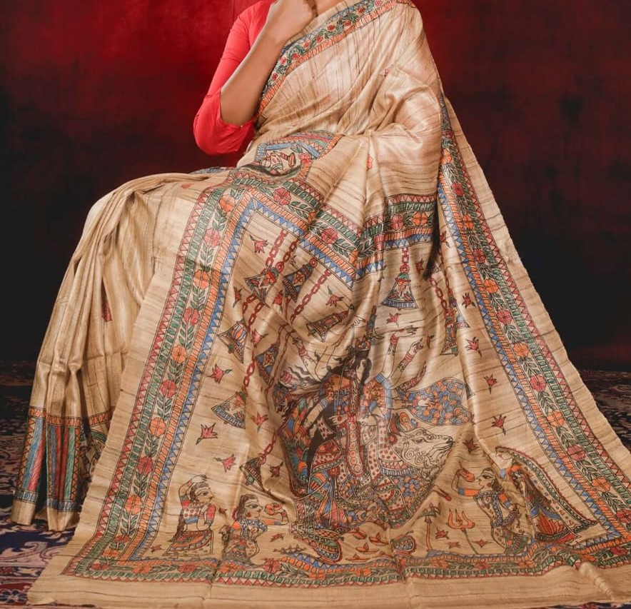 Handloom Pure Tussar Ghicha Silk Saree featuring handpainted Madhubani art on the anchal and border