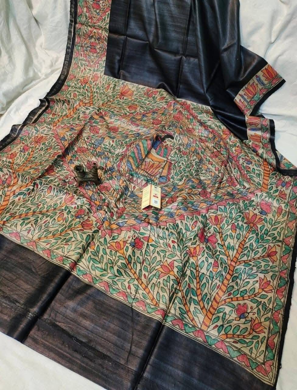 Handloom Pure Tussar Ghicha Silk Saree featuring handpainted Madhubani art on the anchal and border