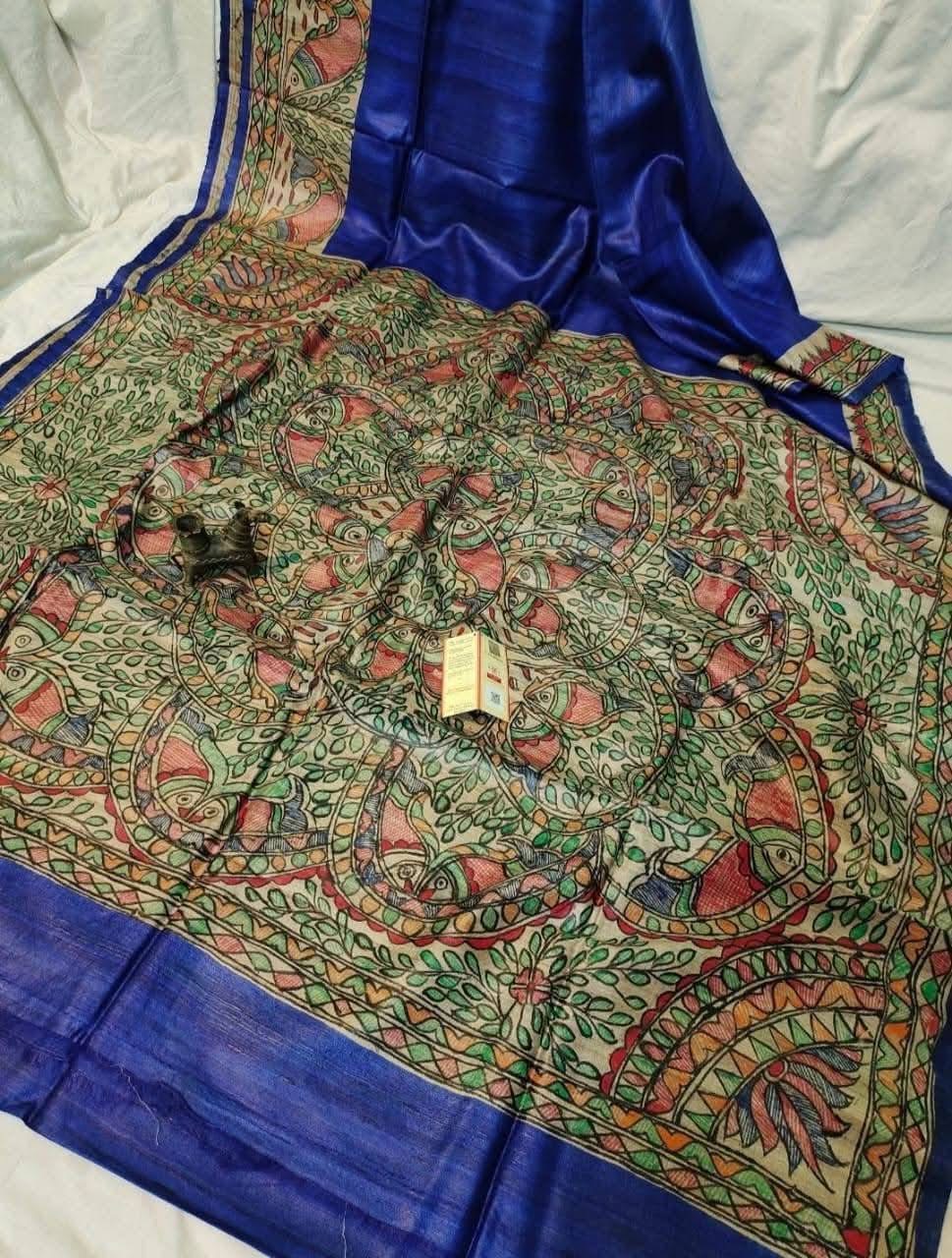 Handloom Pure Tussar Ghicha Silk Saree featuring handpainted Madhubani art on the anchal and border